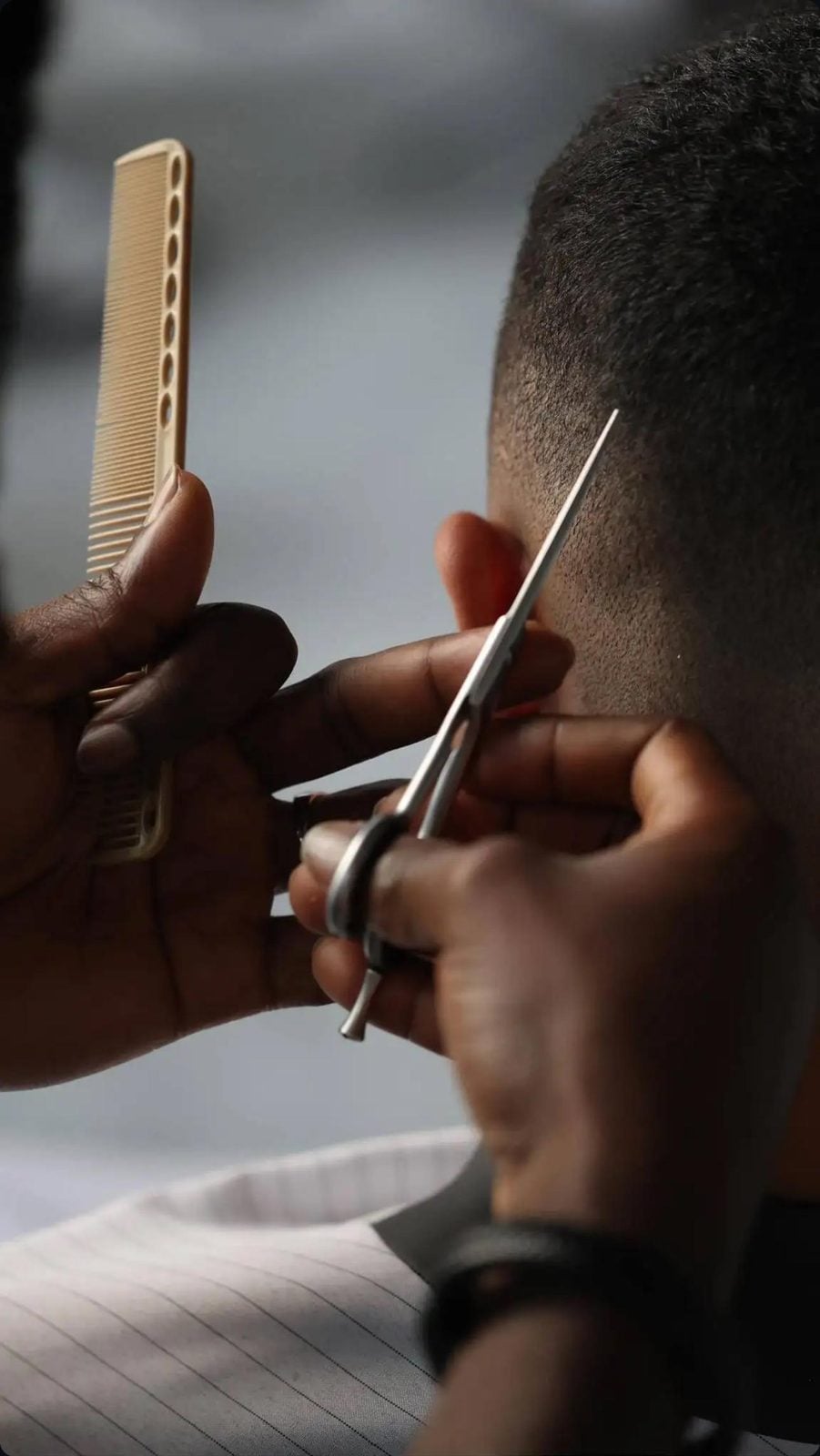 Scissor-over-comb detail at the back of the head