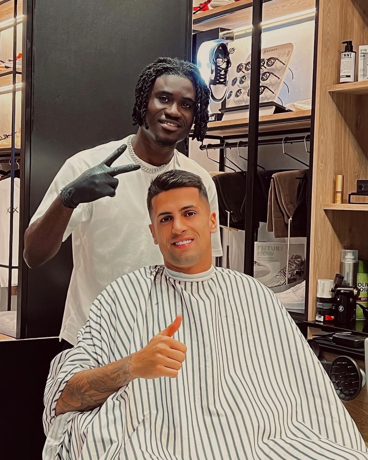Barber and client after a fresh cut